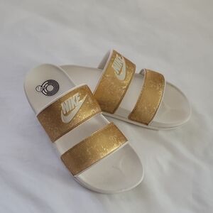 Nike White and Gold Slide Sandals